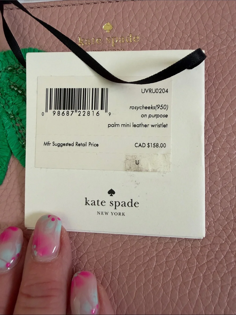 kate spade pink leather wristlet with green palm applique